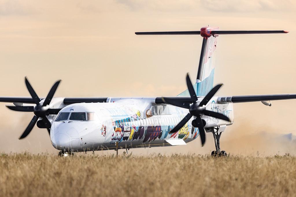 Luxembourg Findel Airport: Luxair (LG / LGL) | Livery: Sumo Artwork's Livery | De Havilland Canada Dash 8-400 DH8D | LX-LQA | MSN 4468