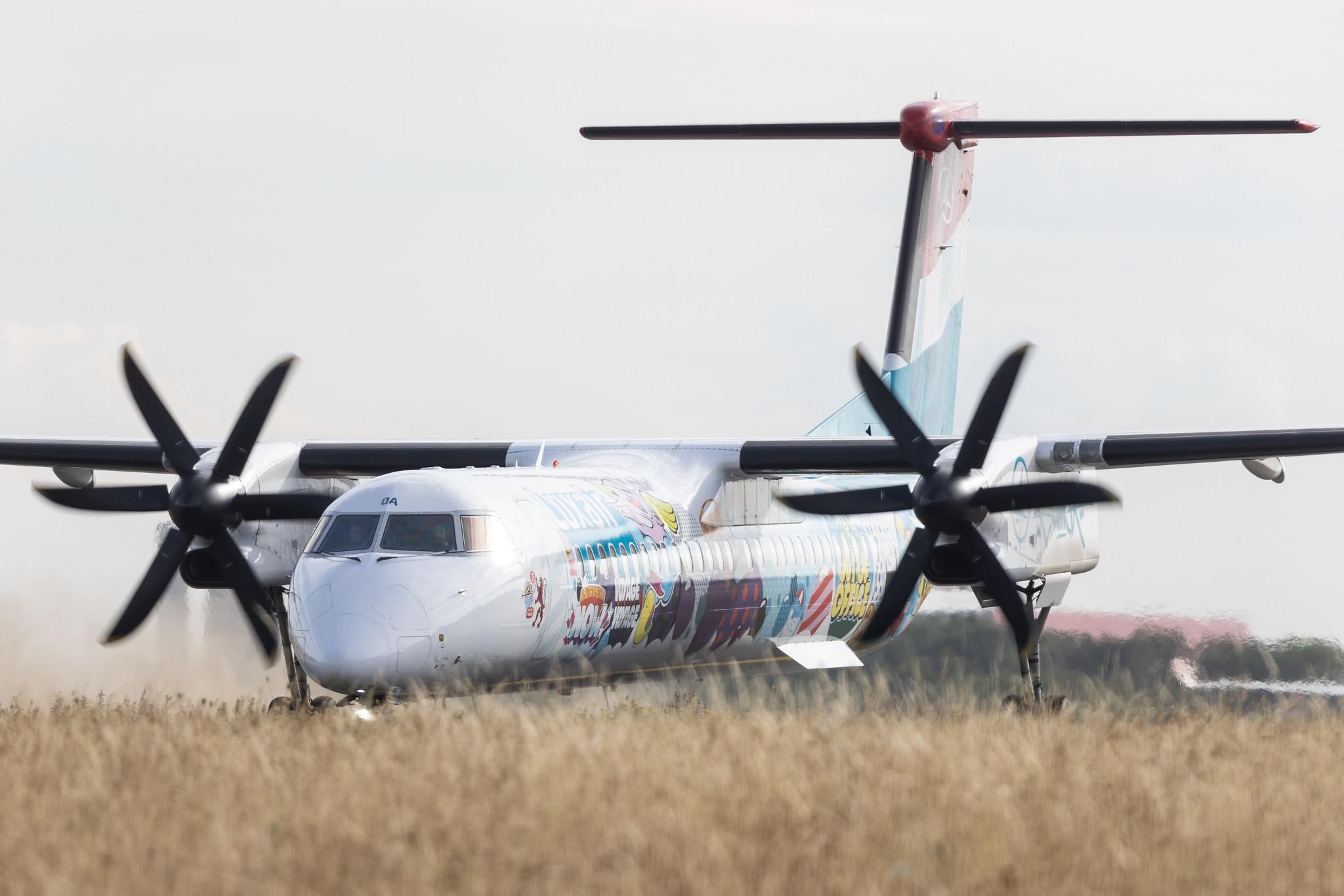 Luxembourg Findel Airport: Luxair (LG / LGL) | Livery: Sumo Artwork's Livery | De Havilland Canada Dash 8-400 DH8D | LX-LQA | MSN 4468