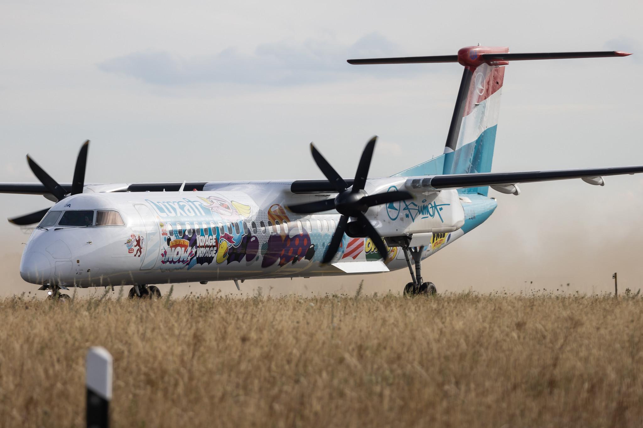 Luxembourg Findel Airport: Luxair (LG / LGL) | Livery: Sumo Artwork's Livery | De Havilland Canada Dash 8-400 DH8D | LX-LQA | MSN 4468
