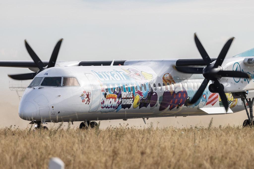 Luxembourg Findel Airport: Luxair (LG / LGL) | Livery: Sumo Artwork's Livery | De Havilland Canada Dash 8-400 DH8D | LX-LQA | MSN 4468